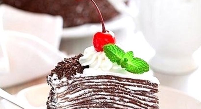 Торт из шоколадный блинчиков со сливочно-шоколадным кремом