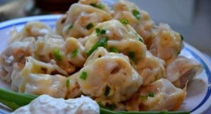 Пельмени жареные под сыром