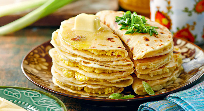 Лепешки костыбый с пшенной кашей и картошкой с луком