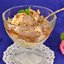 Творожный десерт с карамельным соусом и орехами