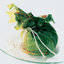 Овощи с кускусом в салатных листьях