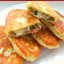 Жареные пирожки из творожного теста с грибами, мясом и сыром