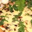 Пицца с грибами и руколой