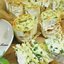 Слоёный пирог из лаваша с творогом, сыром и зеленью