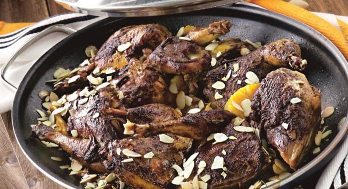 Фазан, тушенный с апельсинами и виноградным соком