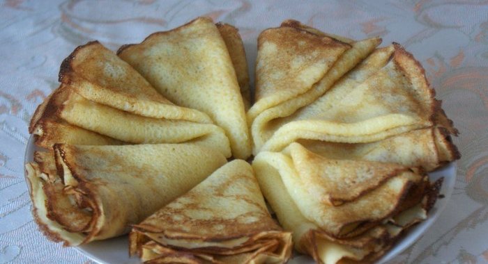 Блинчики на кефире со сливочным маслом