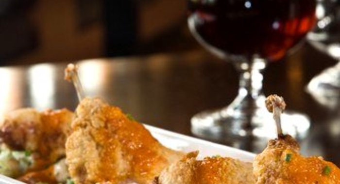 Соте из перепелок с белым вином и овощами