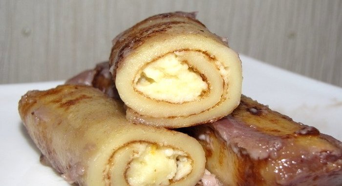 Блинчики с творогом, запеченные в сметане