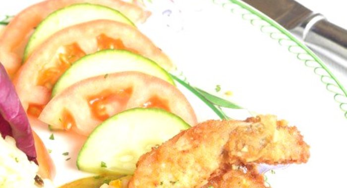 Жареные томатные ломтики в хлебных крошках