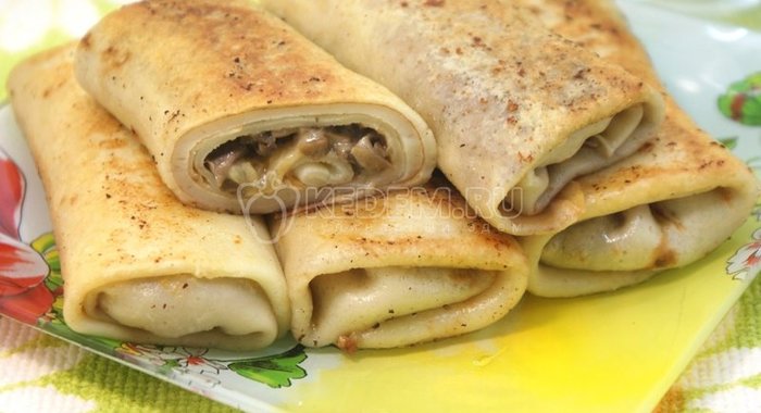 Фаршированные блины с грибами и сыром